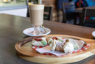 Close-up of breakfast served on table