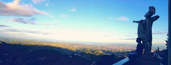 Statue of liberty against blue sky
