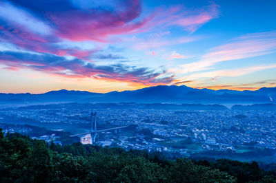 High angle view of townscape against sky during sunset