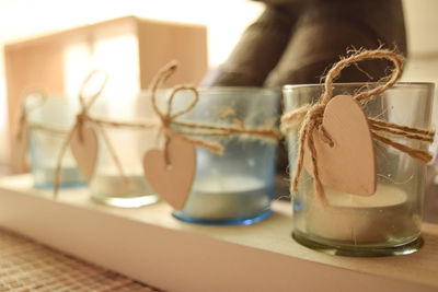 Close-up of candles on table