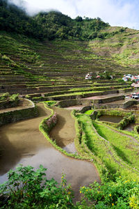 High angle view of agricultural landscape against sky