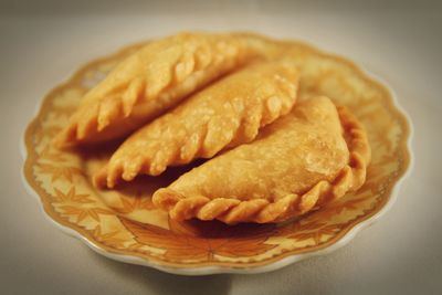 Close-up of dessert against white background