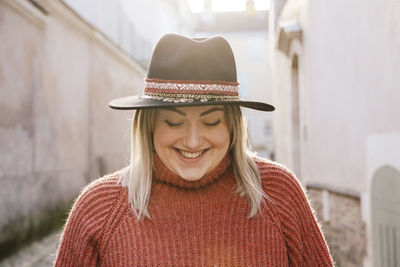 Young woman wearing hat