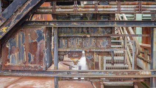 Close-up of rusty machine part of old factory