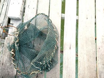 Midsection of person in cage