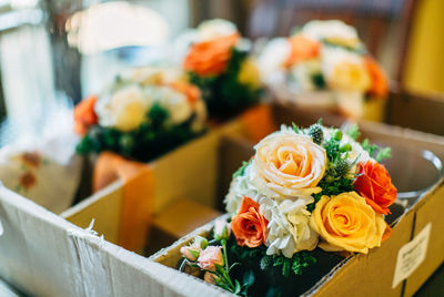 Close-up of bouquet in cardboard box