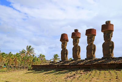 Remains of huge moai statues of ahu nau nau on the anakena beach, easter island of chile