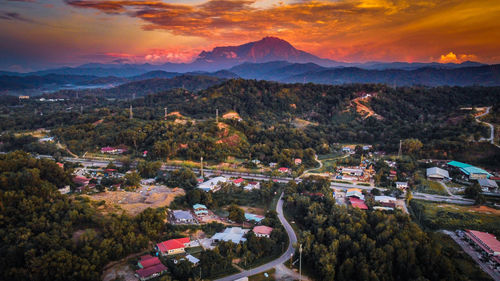 High angle view of city against sky during sunset