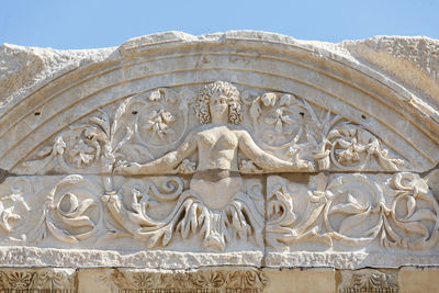 Low angle view of statue against clear sky