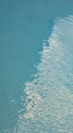 Close-up of blue sea against sky