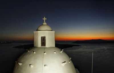 Close-up of illuminated cathedral against sky at night