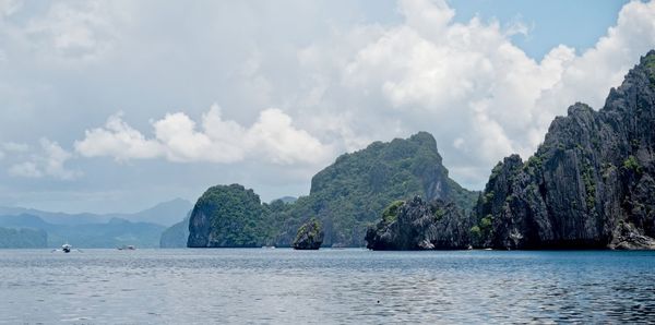 Panoramic view of bay against sky