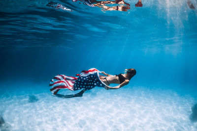 Man swimming in sea