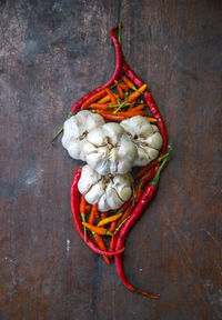 High angle view of chili peppers on table