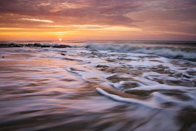 Scenic view of sea during sunset