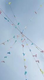 Low angle view of airshow against sky