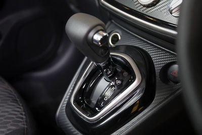 Close-up of gearshift in car