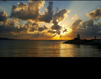 Scenic view of sea at sunset