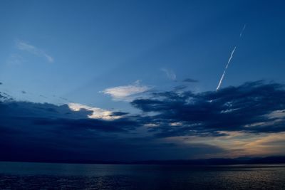 Scenic view of sea against blue sky