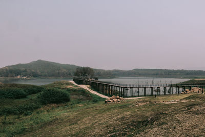 Scenic view of land against clear sky