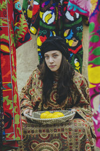 Portrait of young woman wearing traditional clothing