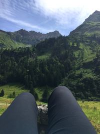 Cropped image of hiker on mountain