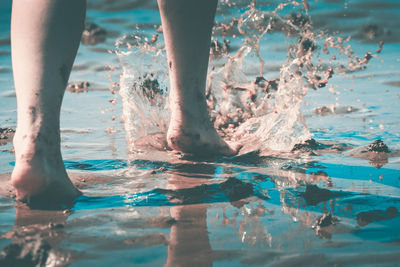 Low section of man on beach