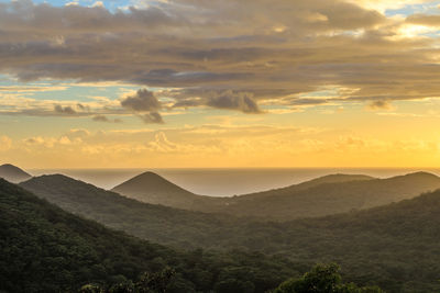 Scenic view of landscape against sky during sunset