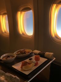 View of food and airplane in window