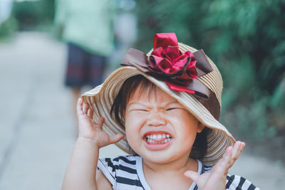 Close-up of cute girl wearing hat