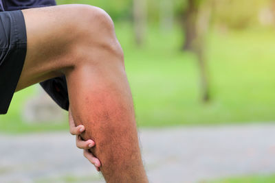 Midsection of man suffering from pain