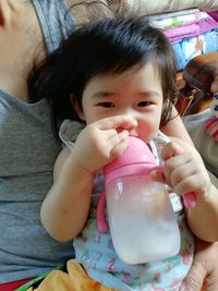 Cute girl drinking milk