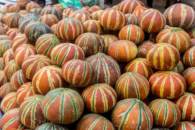 Full frame shot of pumpkins for sale at market stall