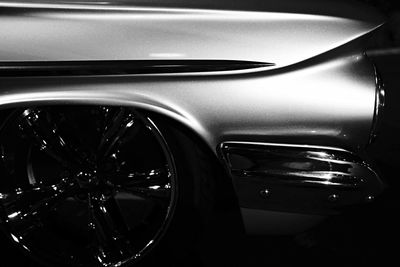 Close-up of car on road