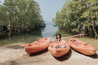 Little girl with her kayak