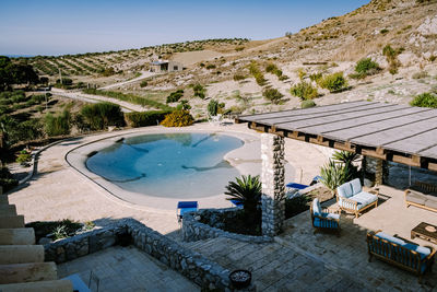 High angle view of swimming pool against buildings