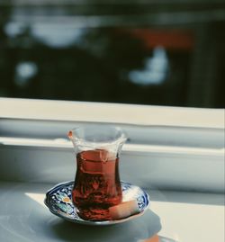 Close-up of tea in glass on table