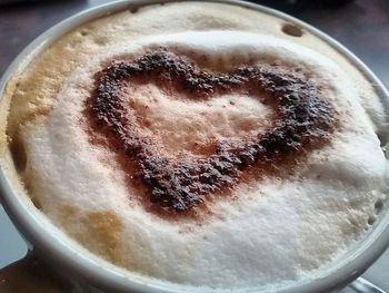 Close-up of coffee cup on table