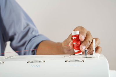 Close-up of man working on table