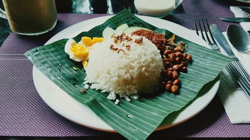 Close-up of served food in plate