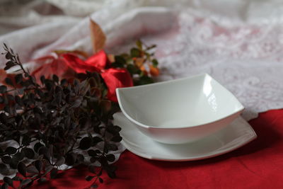 High angle view of red roses on table