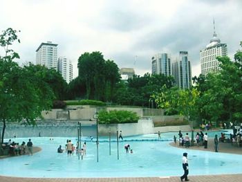 Skyscrapers in city against sky