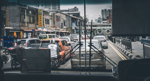 Cars on street in city