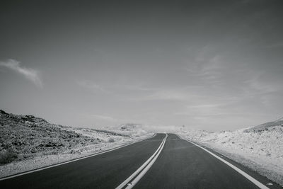 Surface level of road against sky