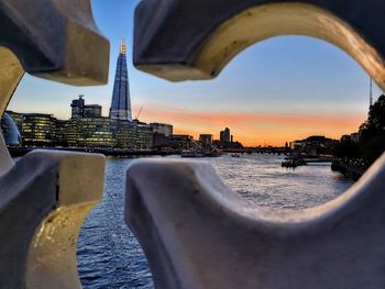 Panoramic view of river and buildings against sky