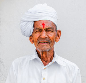 Portrait of senior man wearing turban outdoors