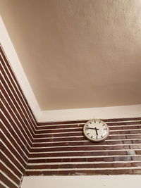 Low angle view of clock