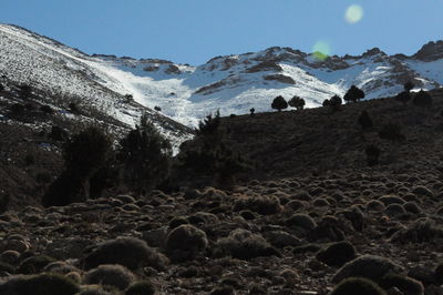 Scenic view of rocky mountains against sky