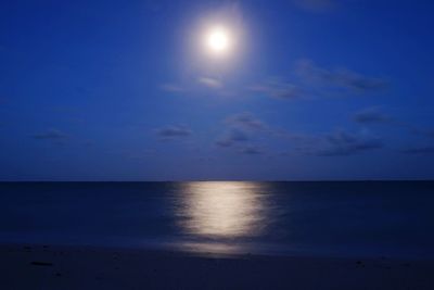 Scenic view of sea against sky at night