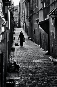 Person walking in alley